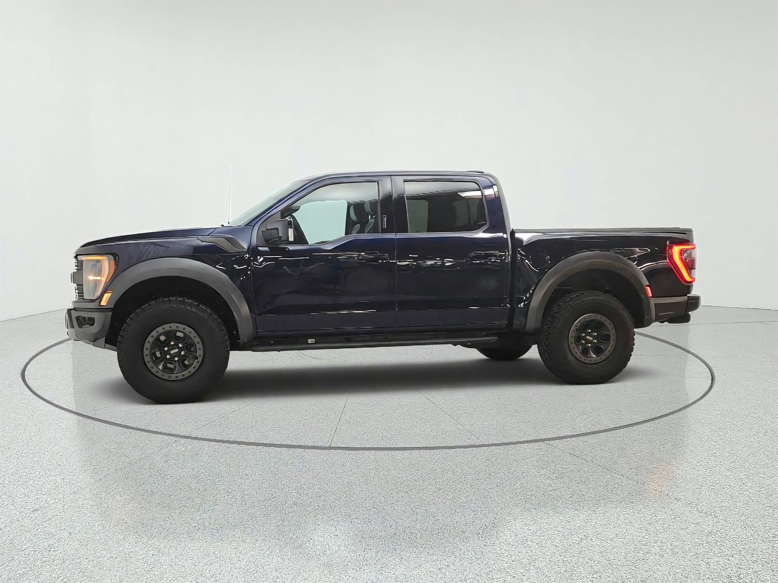 Used 2023 Antimatter Blue Metallic Ford Raptor 4WD SuperCrew 5.5
