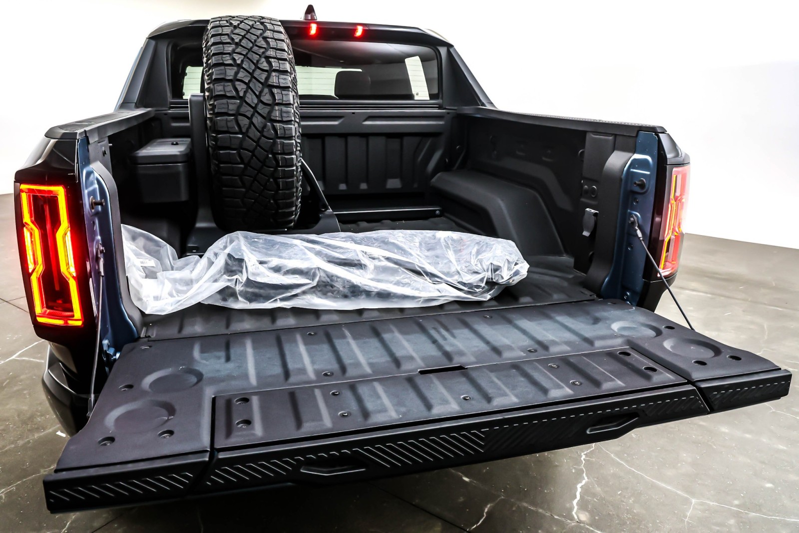 Used 2024 Neptune Blue Matte GMC e4WD Crew Cab 3X image 21