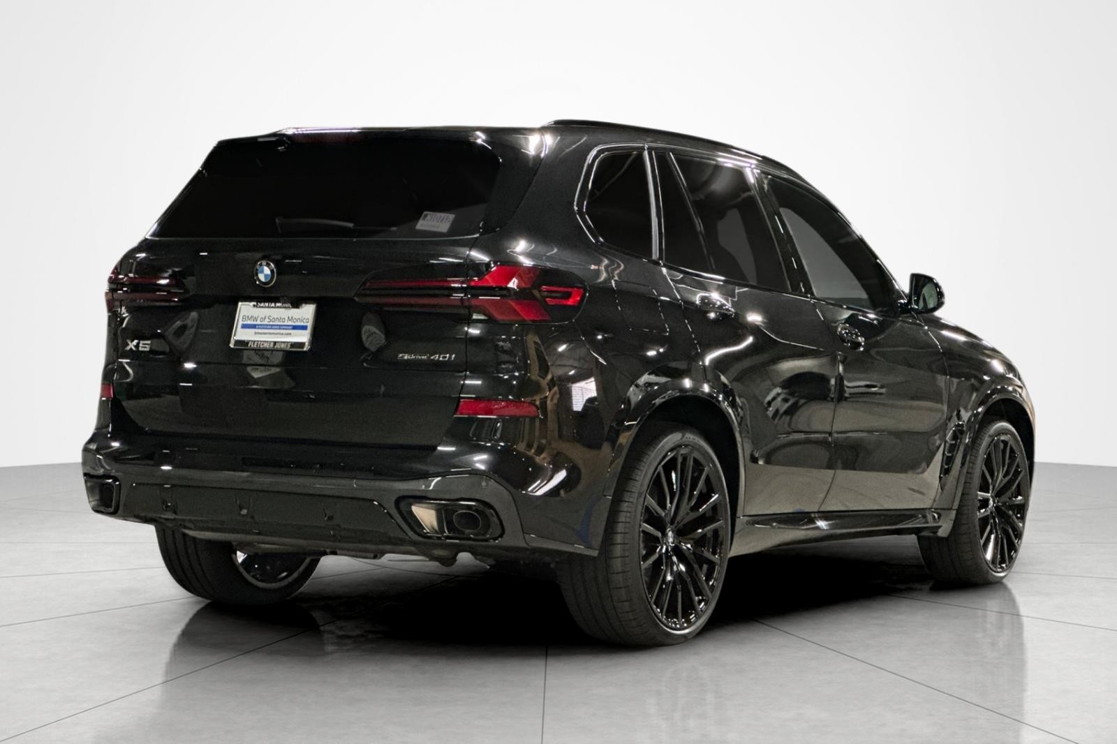 New 2026 Black Sapphire Metallic BMW sDrive40i image 5