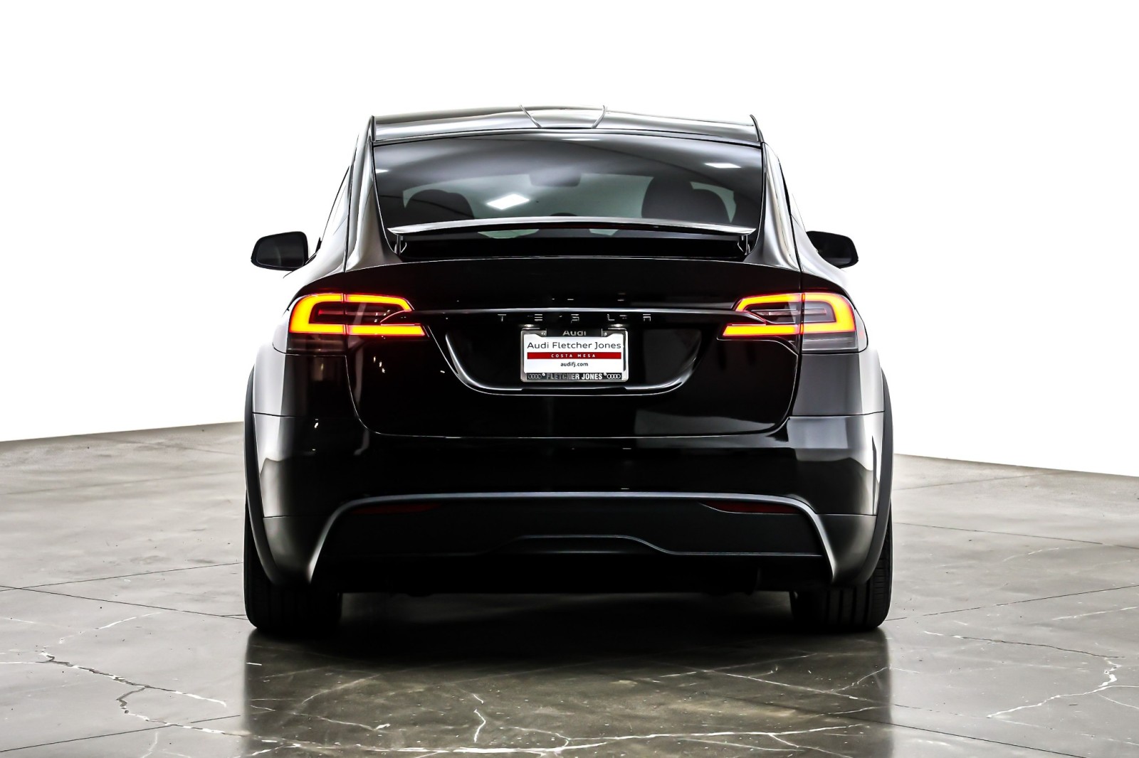 Used 2024 Solid Black Tesla AWD image 4