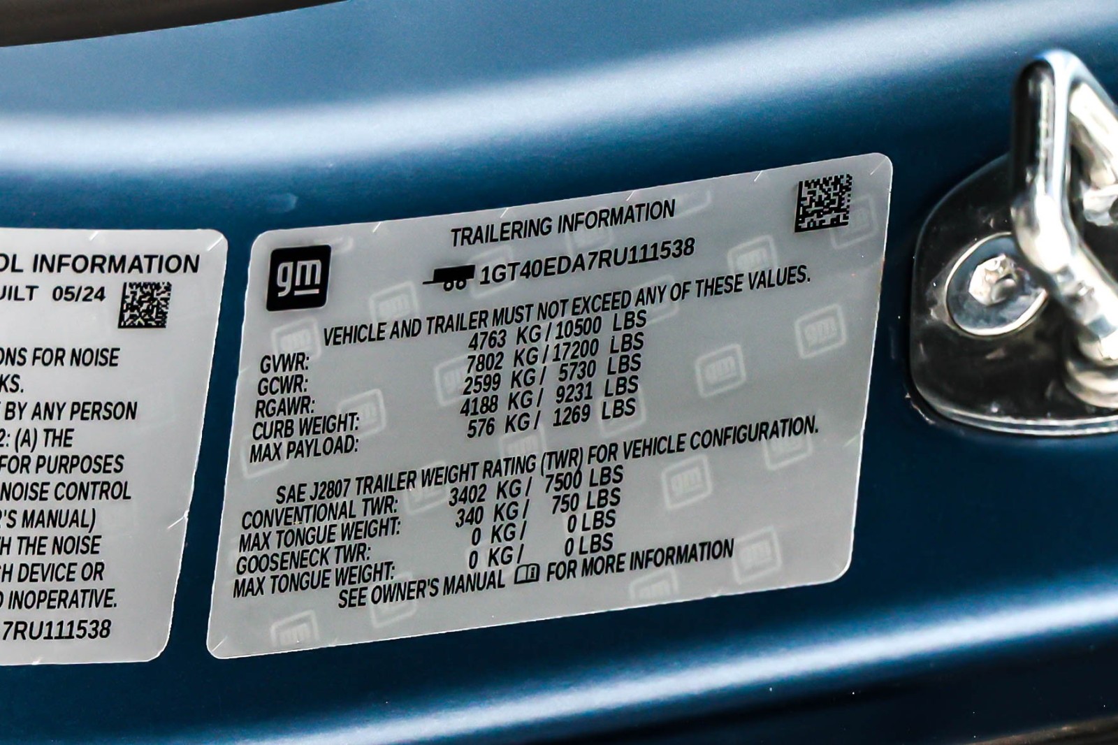 Used 2024 Neptune Blue Matte GMC e4WD Crew Cab 3X image 24