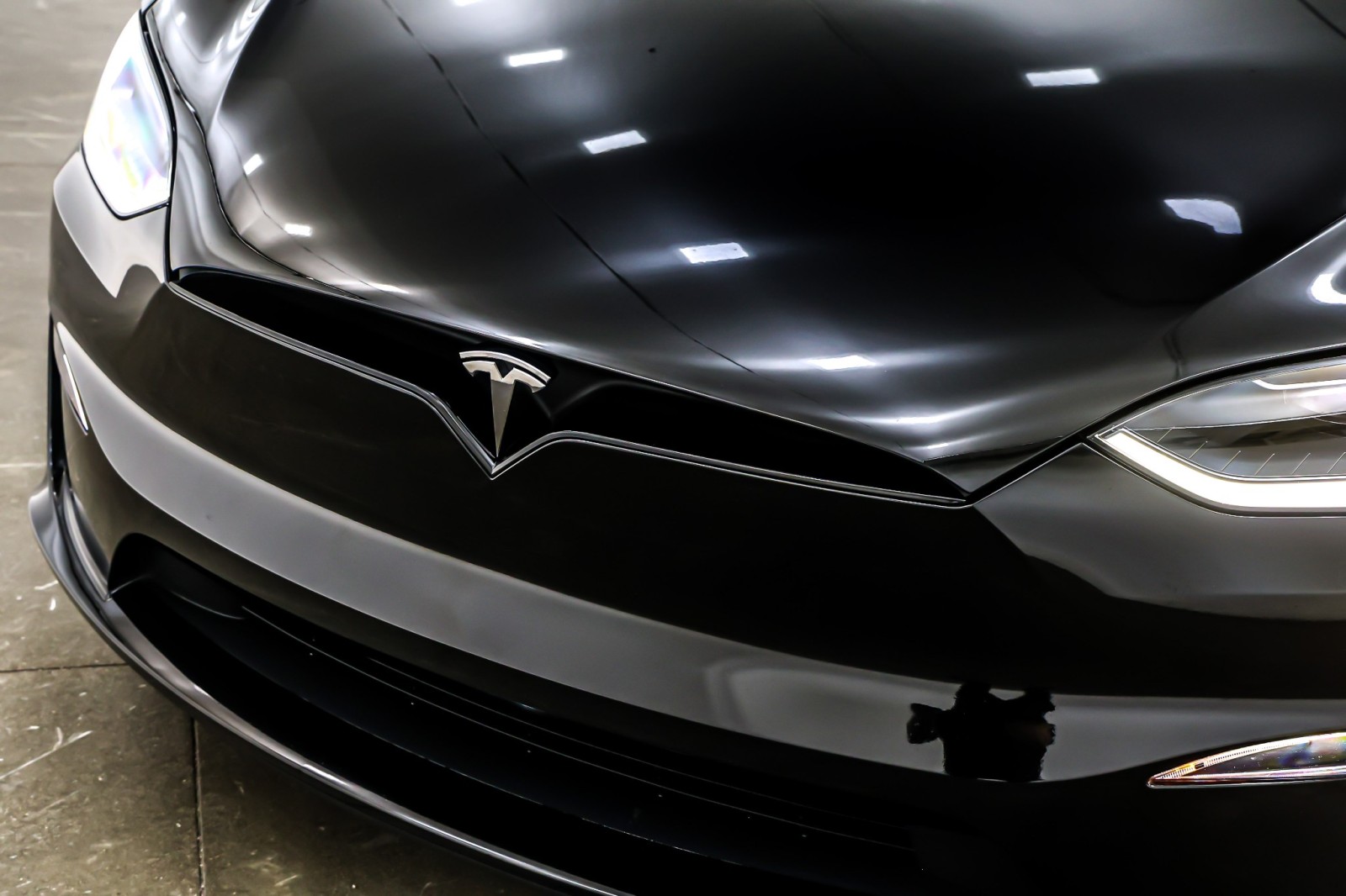 Used 2024 Solid Black Tesla AWD image 13