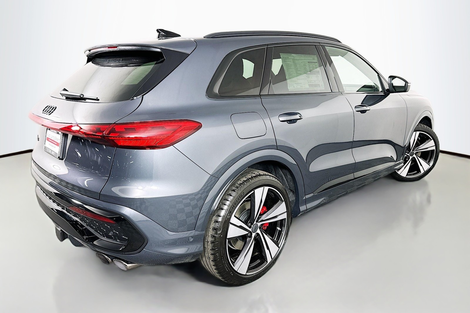 New 2026 Tambora Gray Metallic Audi Premium Plus image 13