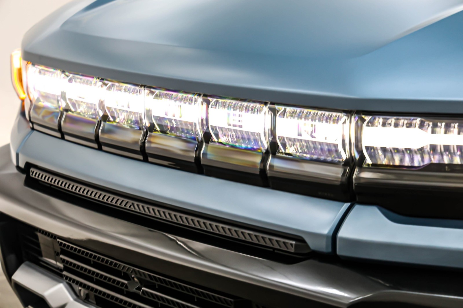 Used 2024 Neptune Blue Matte GMC e4WD Crew Cab 3X image 12