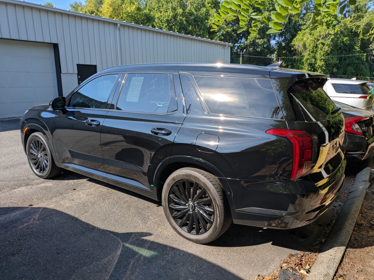View vehicle photo 4