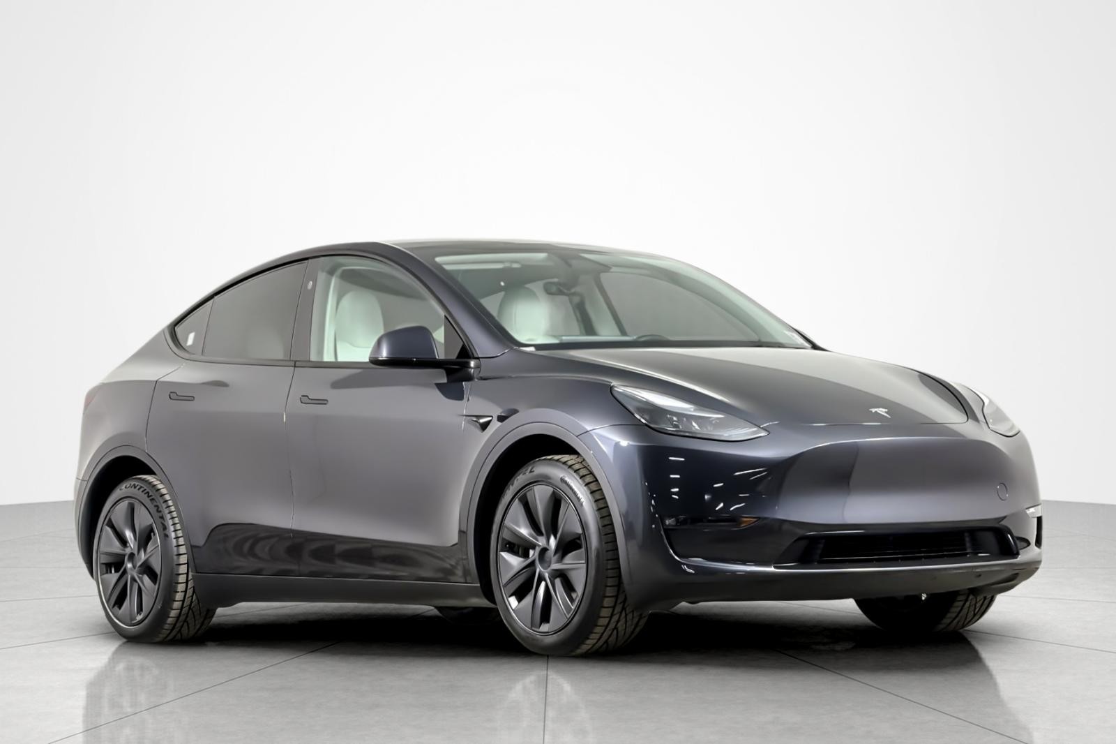 Used 2025 STEALTH GRAY Tesla Long Range AWD *Ltd Avail* image 7