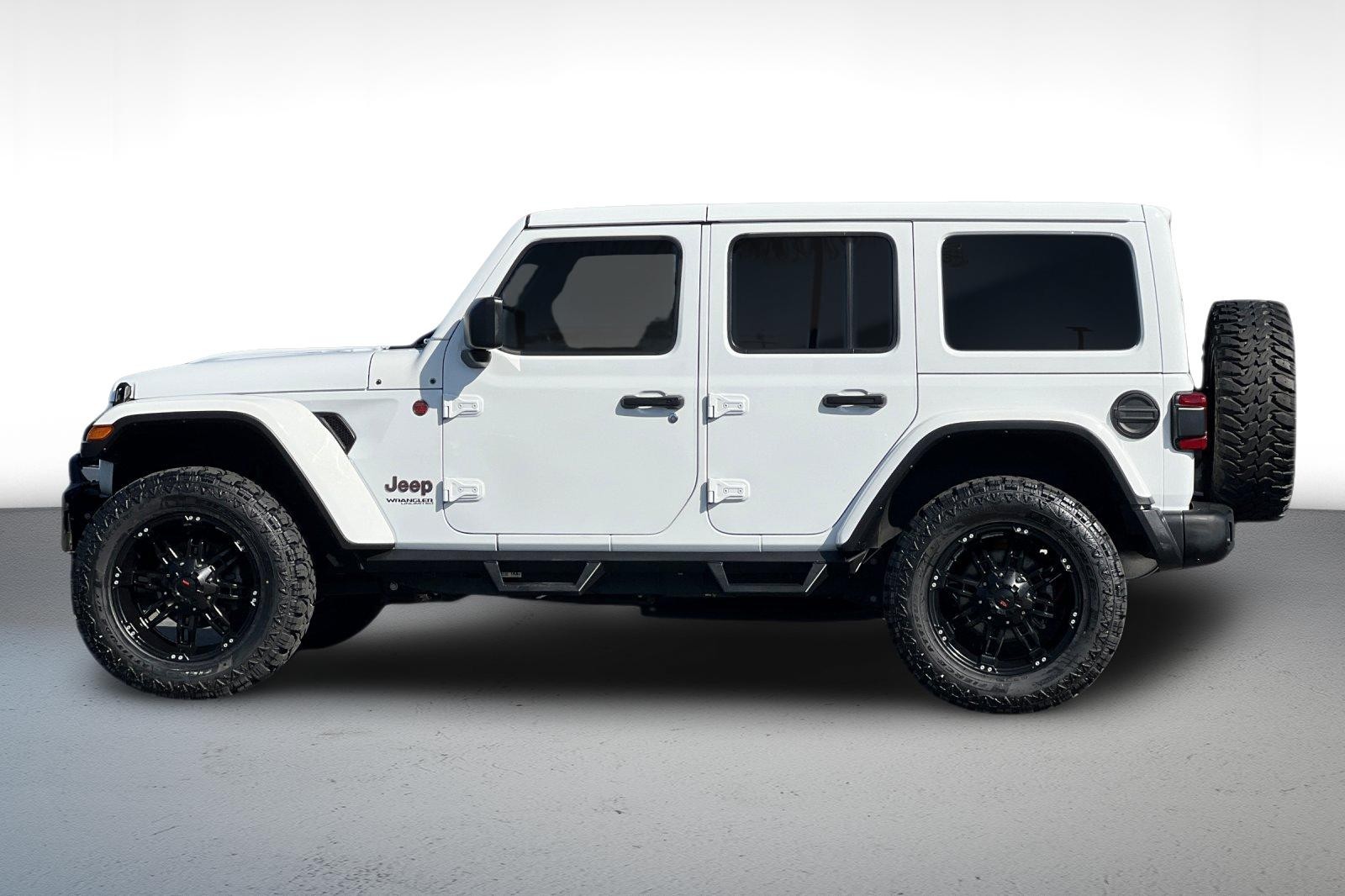 Used 2022 Jeep Wrangler Unlimited Rubicon with VIN 1C4HJXFG9NW138203 for sale in Long Beach, CA