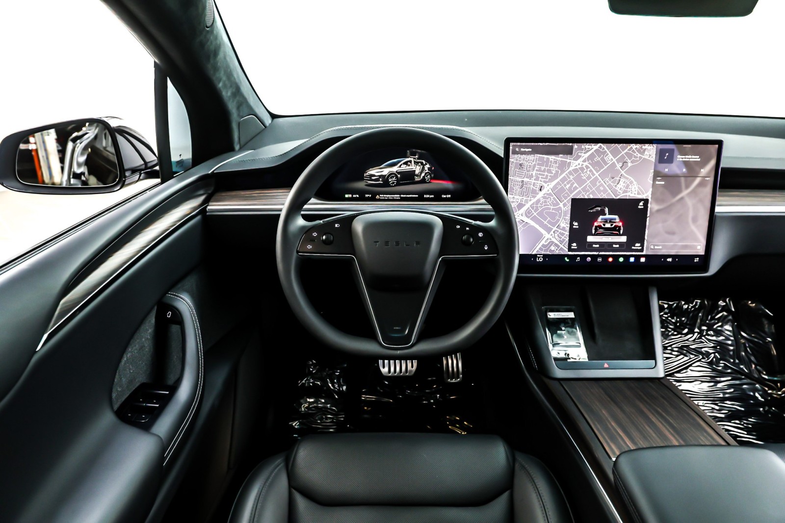 Used 2024 Solid Black Tesla AWD image 5