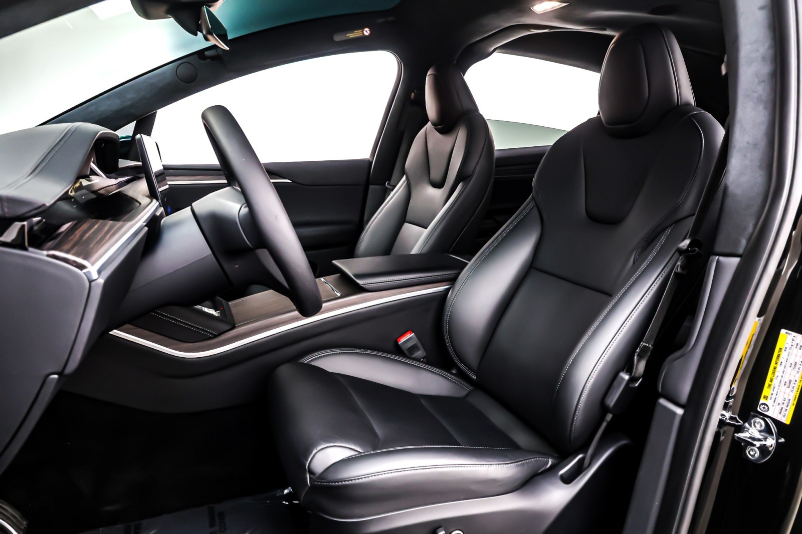 Used 2024 Solid Black Tesla AWD image 17