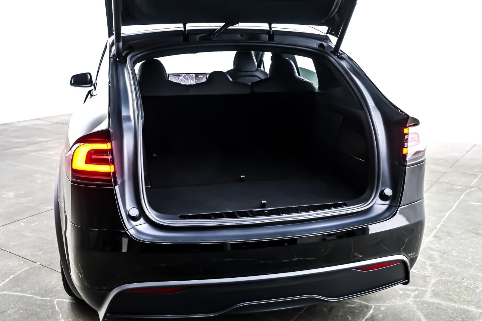 Used 2024 Solid Black Tesla AWD image 23