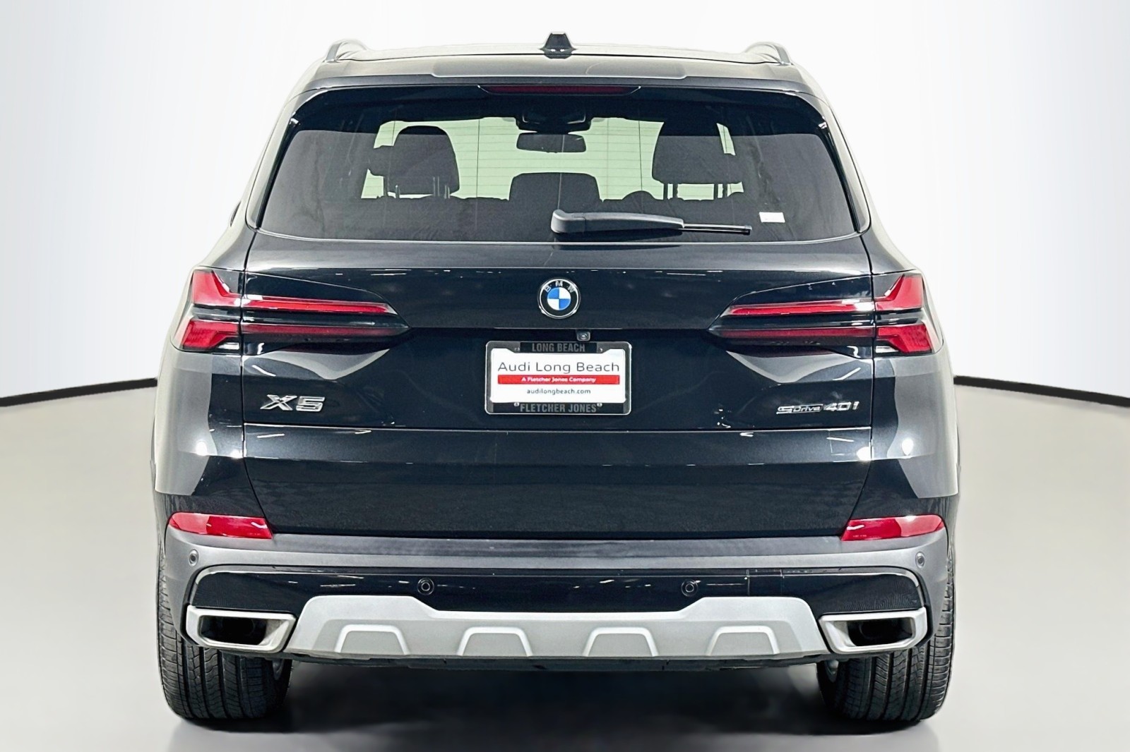 Used 2025 Black Sapphire Metallic BMW sDrive40i image 3