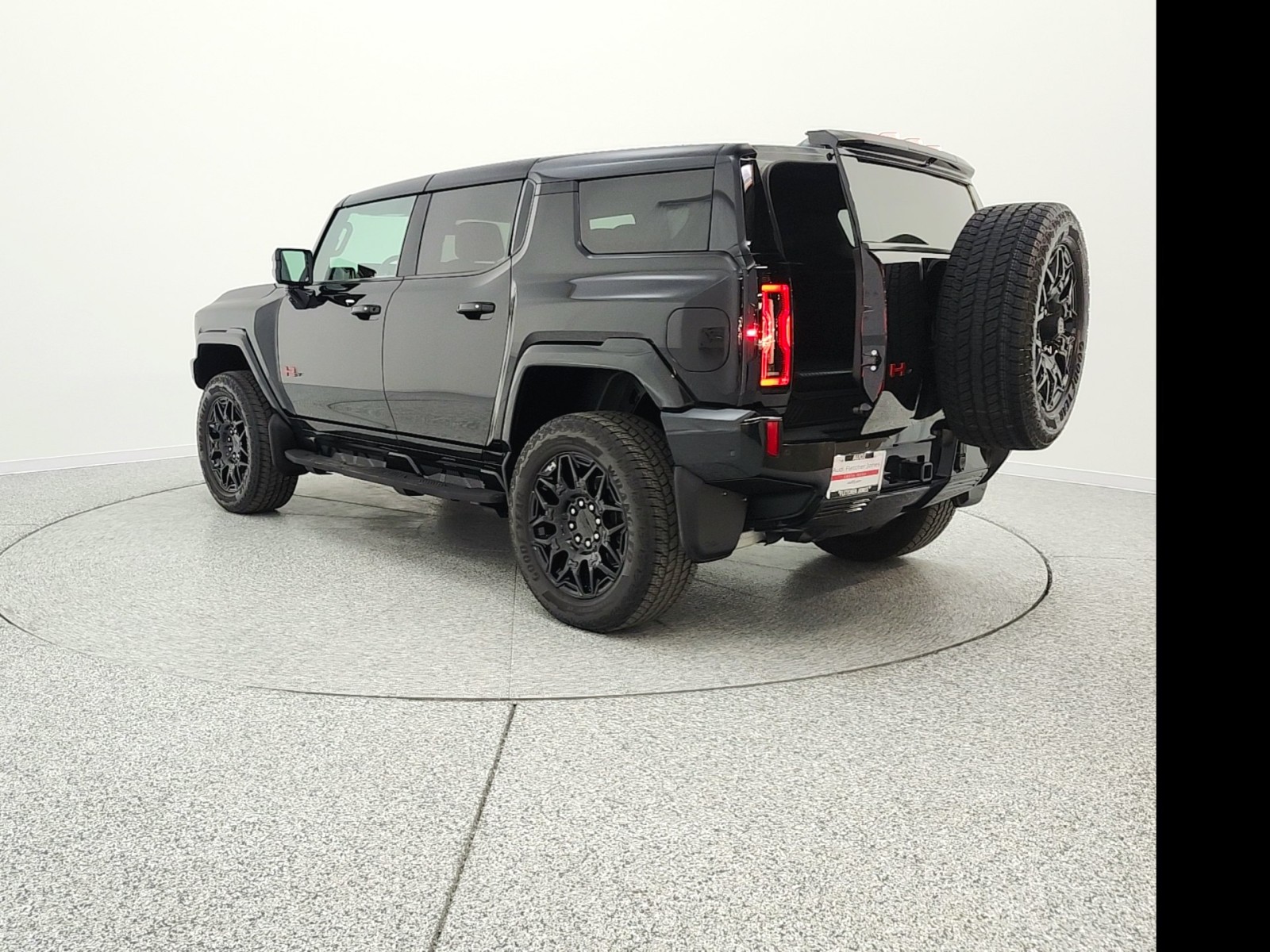 Used 2024 Void Black GMC e4WD 4dr 2X image 7