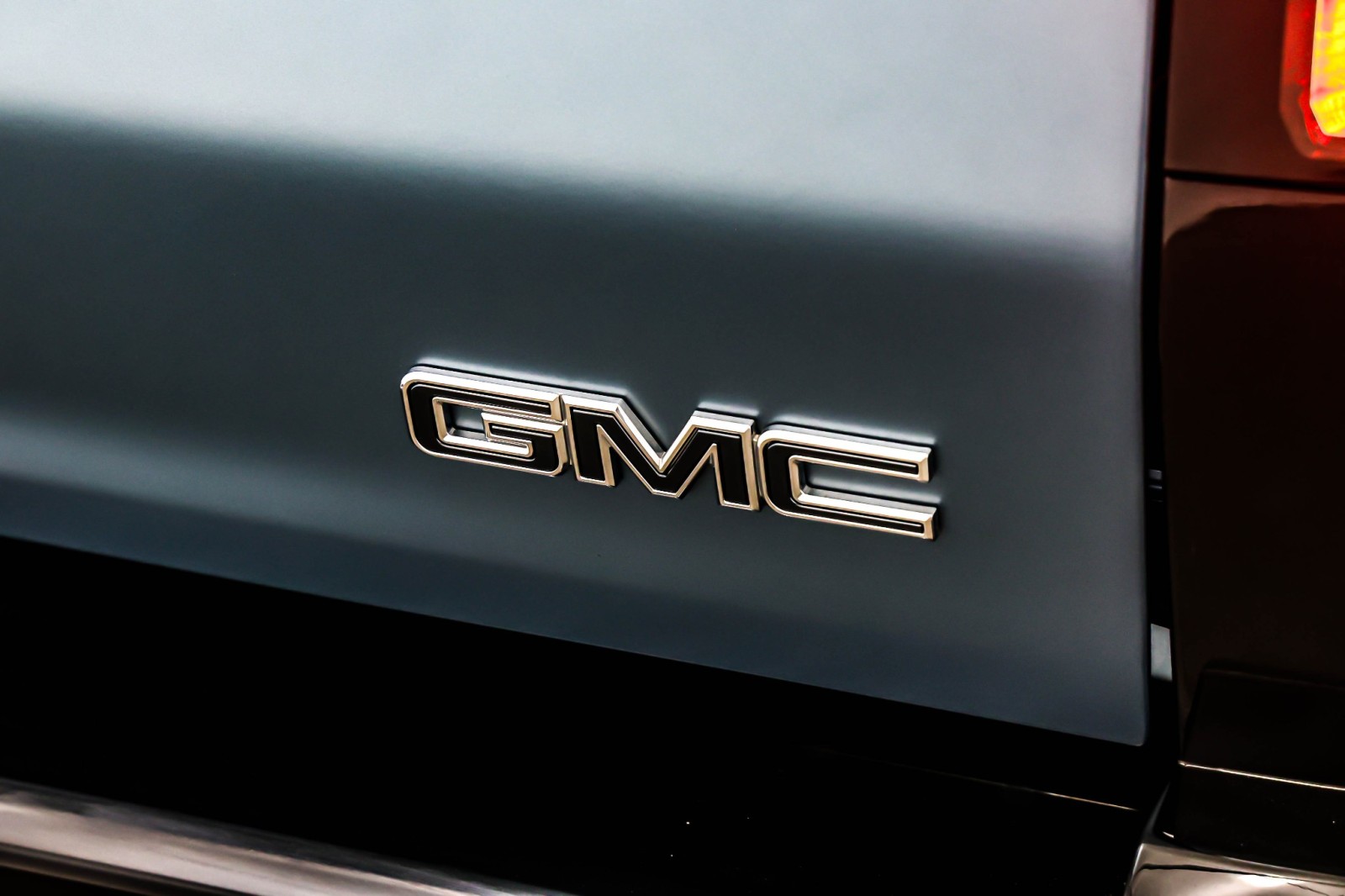 Used 2024 Neptune Blue Matte GMC e4WD Crew Cab 3X image 9