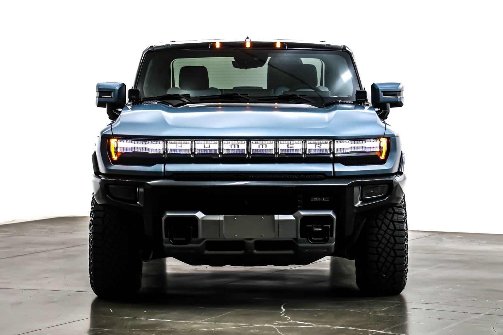 Used 2024 Neptune Blue Matte GMC e4WD Crew Cab 3X image 2