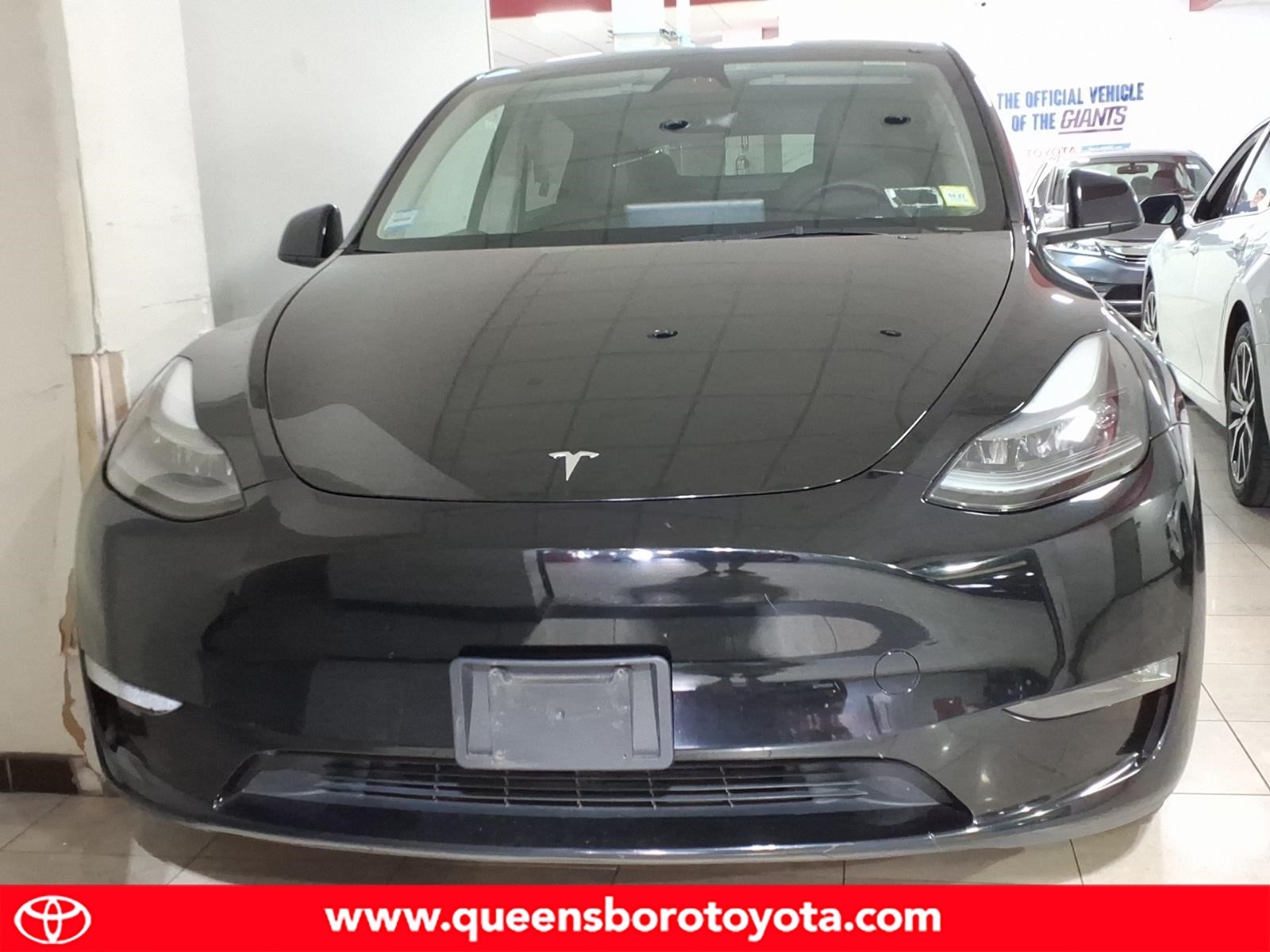 Used 2023 Tesla Model Y Long Range with VIN 7SAYGAEE2PF922146 for sale in Woodside, NY