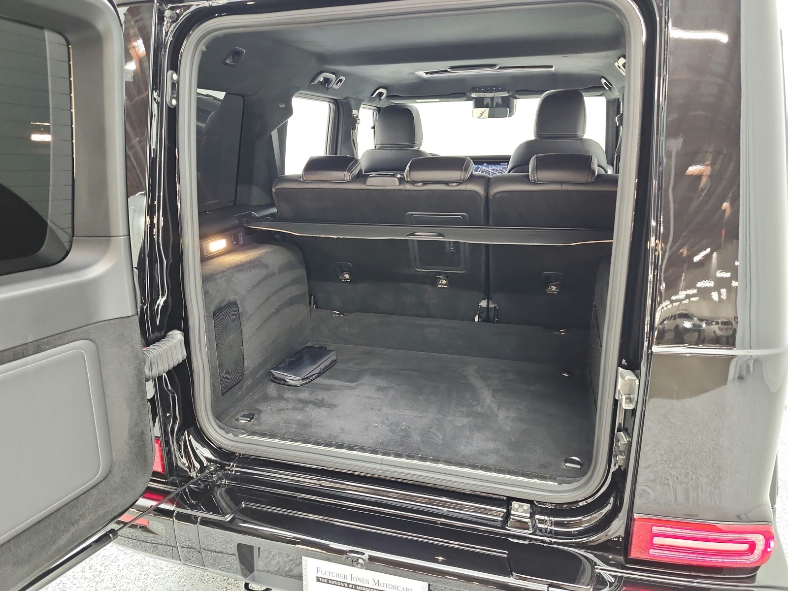 Used 2025 Obsidian Black Metallic Mercedes-Benz G 550 SUV image 29