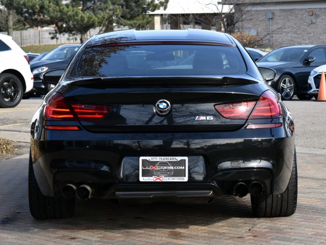 2014 BMW M6 Modified Emissions Executive Pkg. Driving Assist Plus Bang & Olufsen Carbon Fiber Roof Head Up Blind Spot MSRP $130,550 11