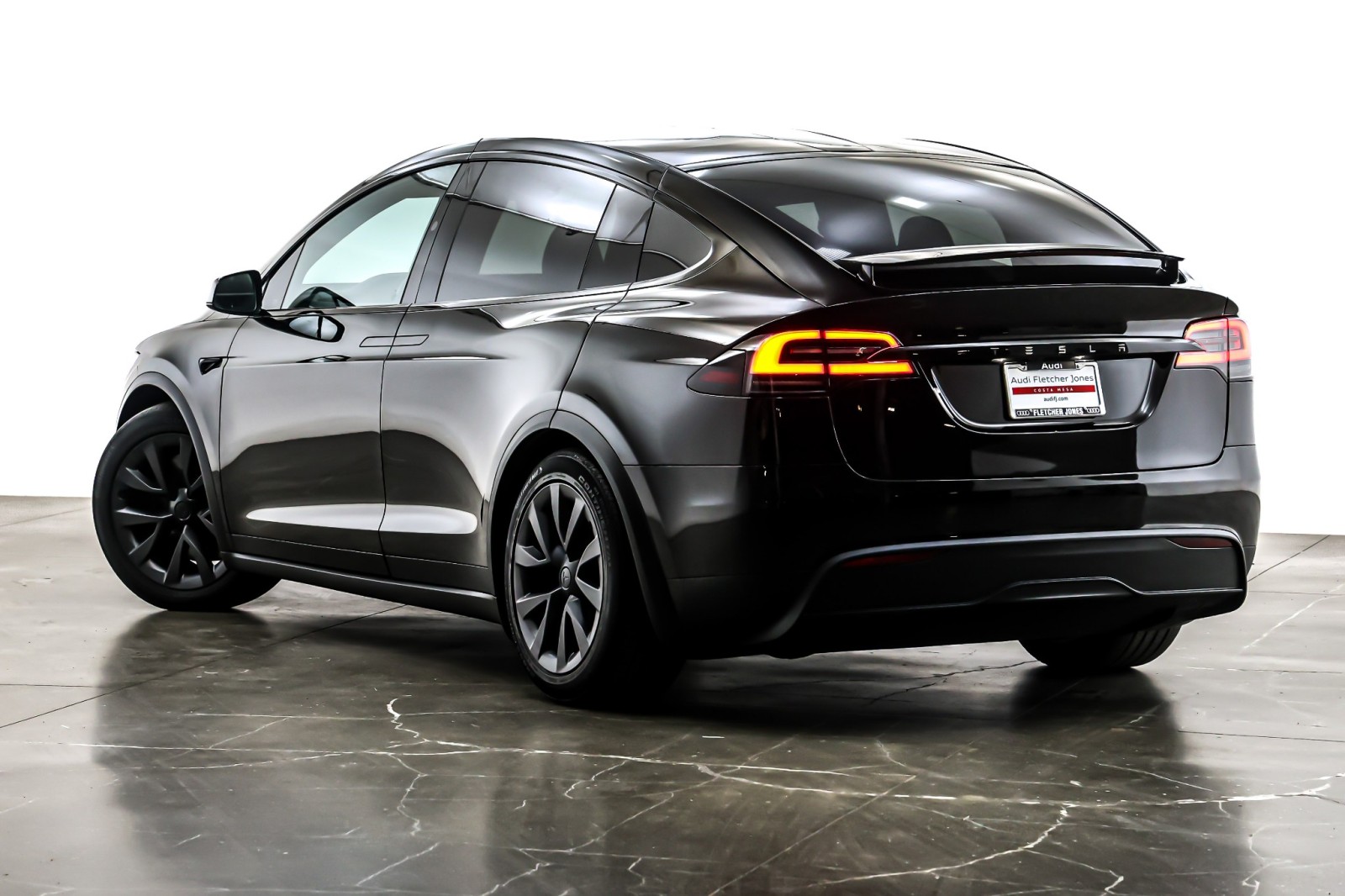 Used 2024 Solid Black Tesla AWD image 12