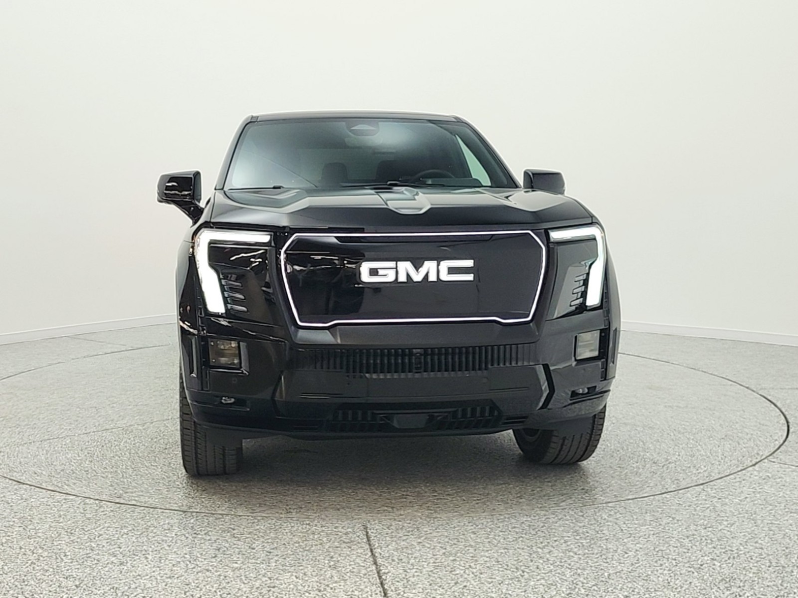 Used 2025 Onyx Black GMC e4WD Crew Cab Max Range Denali image 2