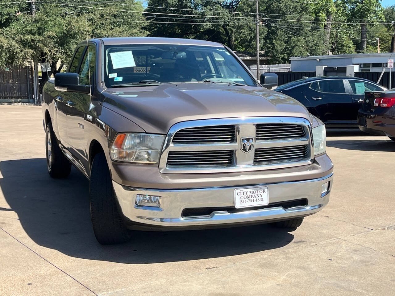 Brown (Austin Tan Pearlcoat) 2010 Dodge RAM 1500 Pickup Truck 4X2 Automatic