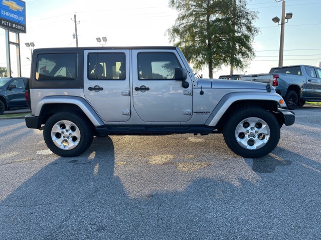 used 2013 Jeep Wrangler Unlimited car, priced at $16,480